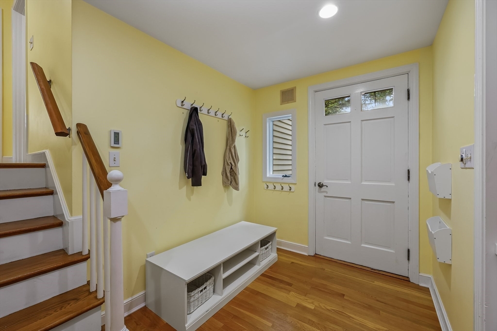 9 Tower Drive Dover, MA 02030 - Photo 11 of 26 a view of room with wooden floor and stairs