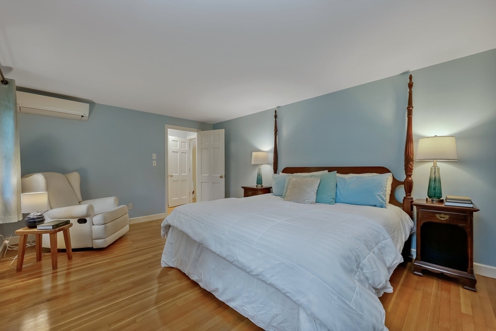 9 Tower Drive Dover, MA 02030 - Photo 12 of 26 a bedroom with a bed and window