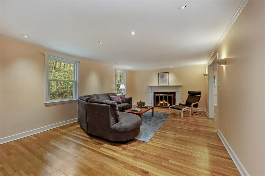 9 Tower Drive Dover, MA 02030 - Photo 9 of 26 a living room with furniture and a fireplace