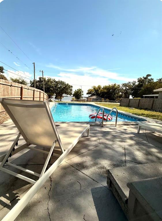 1065 North 10th Street Eagle Lake, FL 33839 - Photo 13 of 16 a view of a swimming pool with an outdoor seating