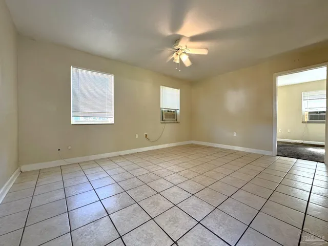 a view of an empty room and window