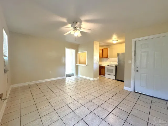 a view of a kitchen with a sink and a cabinets