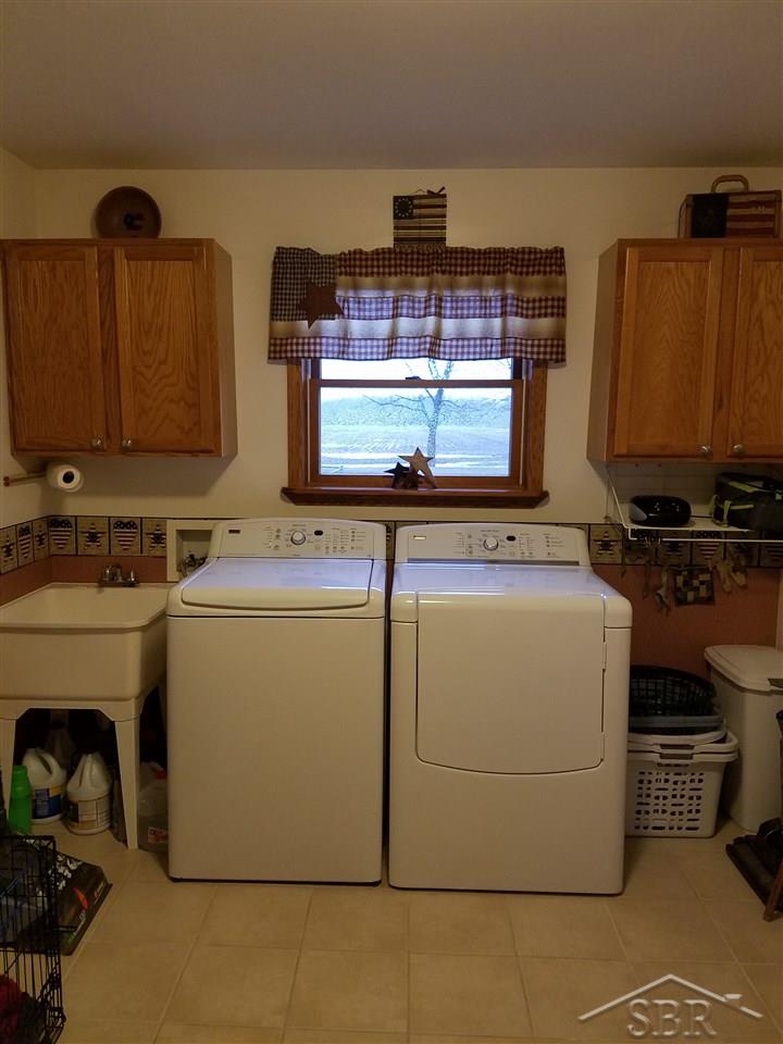 4580 West Gary Road Chesaning, MI 48616 - Photo 31 of 32 Can be converted into 4th bedroom if needed. Additional laundry hook-up in large walk in pantry by kitchen area.