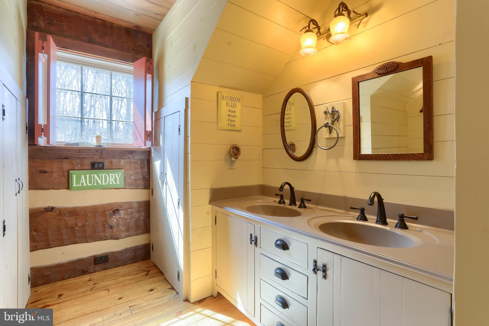 4428 Fairview Road Columbia, PA 17512 - Photo 12 of 30 Hall bath with tub shower & laundry chute
