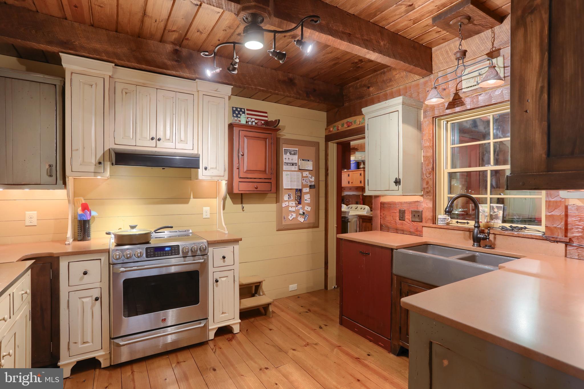 4428 Fairview Road Columbia, PA 17512 - Photo 6 of 30 Inviting and functional kitchen (with a hidden TV)
