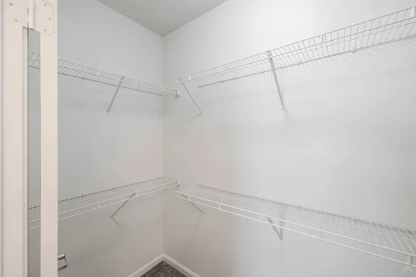 a view of a room with racks on the wall