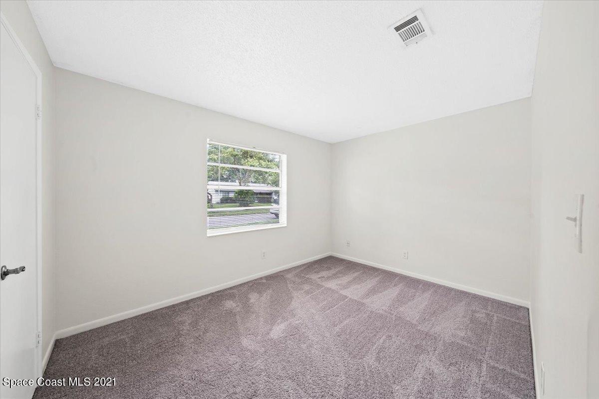 561 Parker Road Melbourne, FL 32904 - Photo 26 of 36 new carpet in bedroom