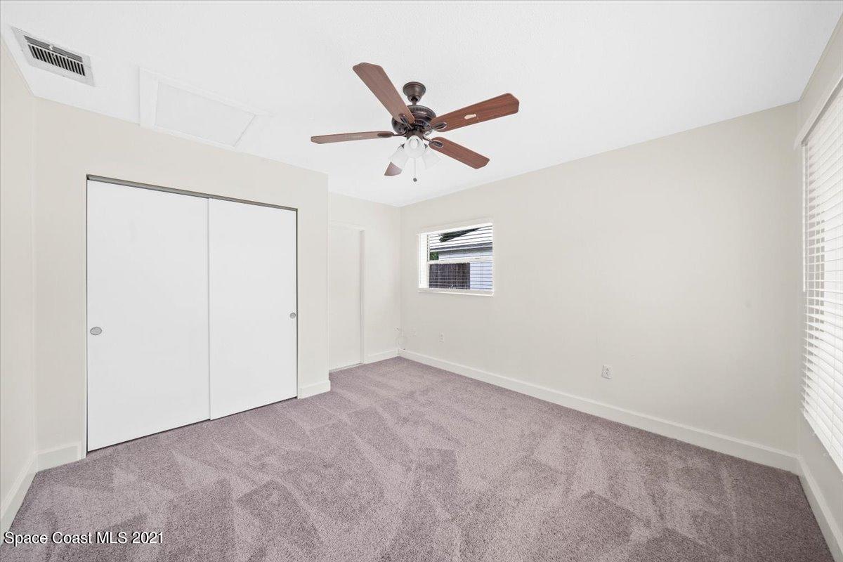 561 Parker Road Melbourne, FL 32904 - Photo 28 of 36 Ceiling fan - new carpet