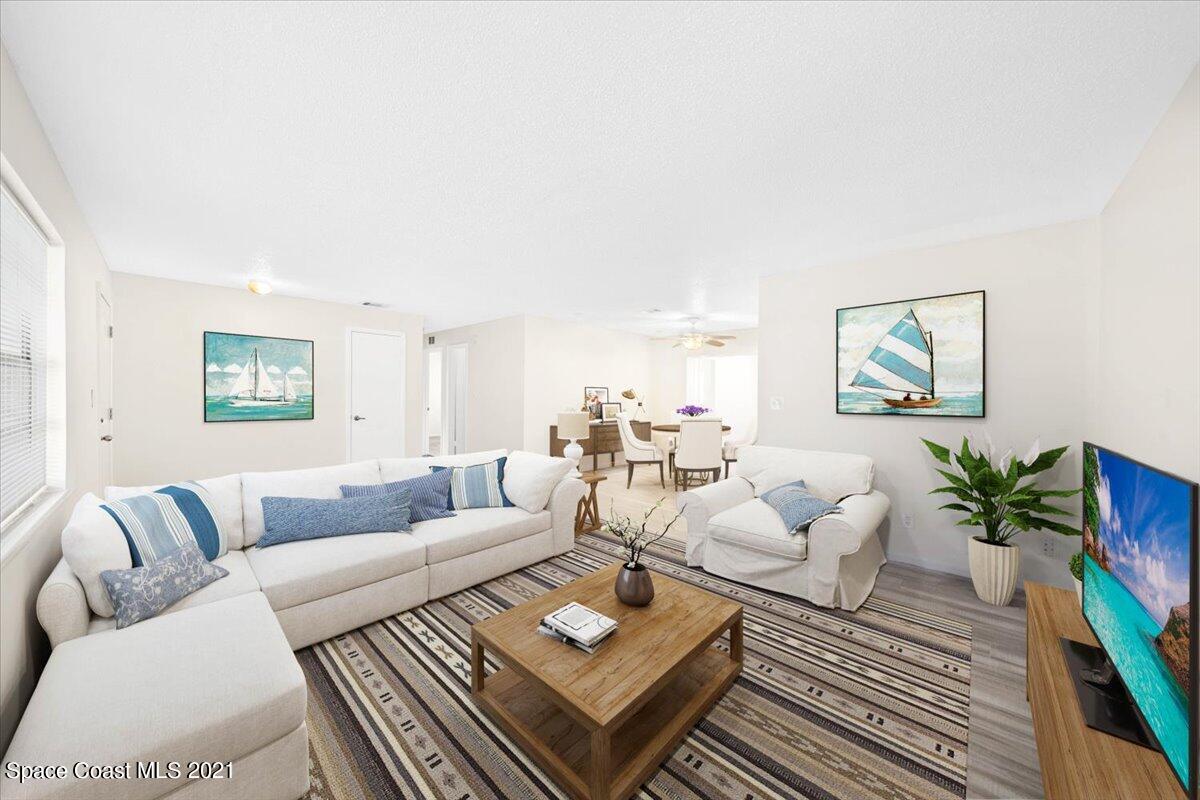 561 Parker Road Melbourne, FL 32904 - Photo 7 of 36 Virtual staging of family room