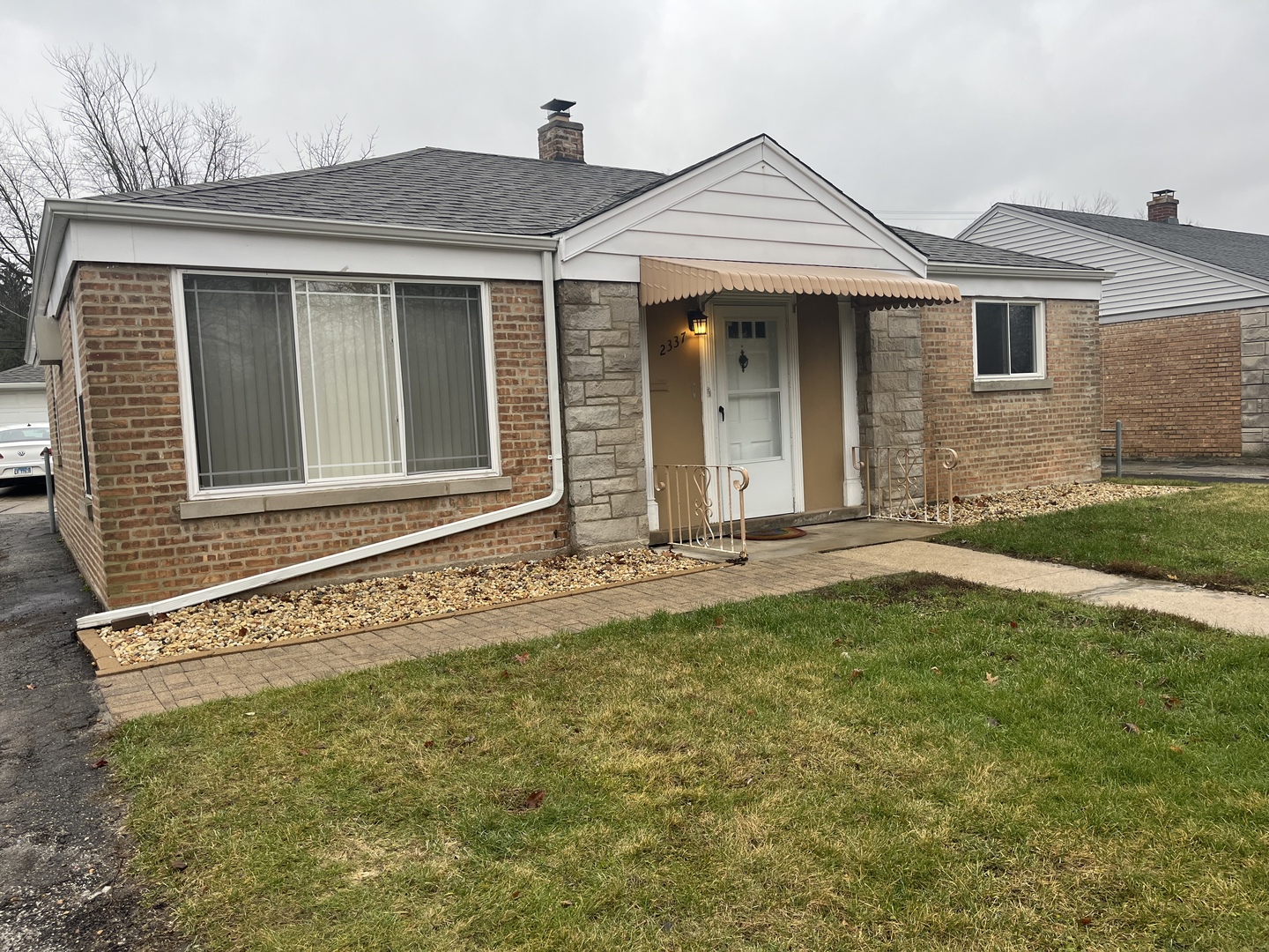 2337 175th Street Homewood, IL 60430 - Photo 2 of 12 a front view of a house with garden