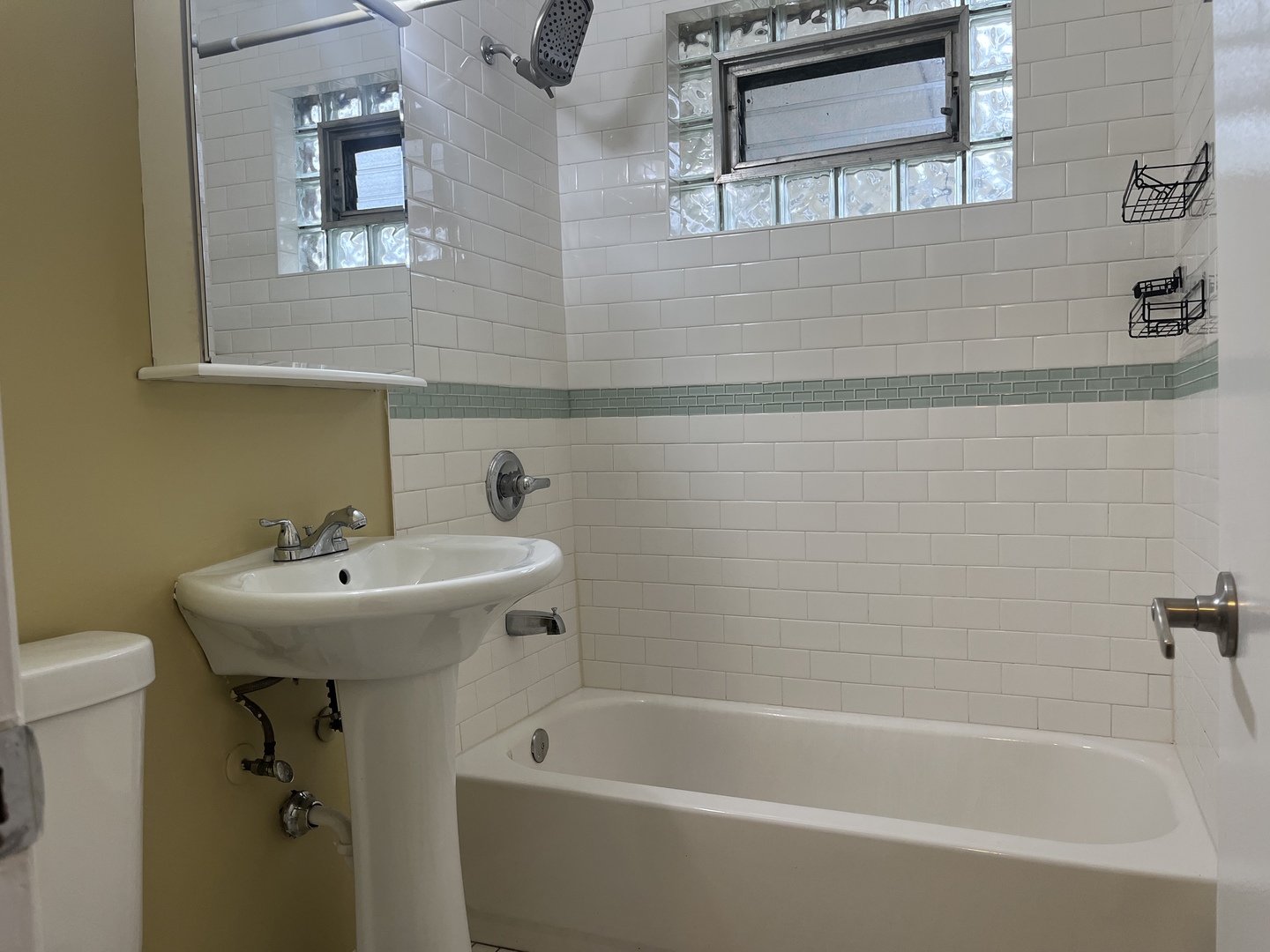 2337 175th Street Homewood, IL 60430 - Photo 8 of 12 a bathroom with a sink a toilet and bathtub