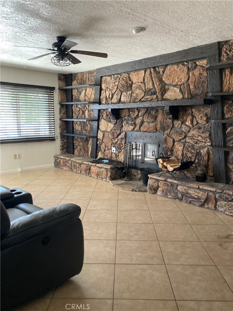 1201 Elizabeth Street Barstow, CA 92311 - Photo 14 of 19 a living room with fireplace