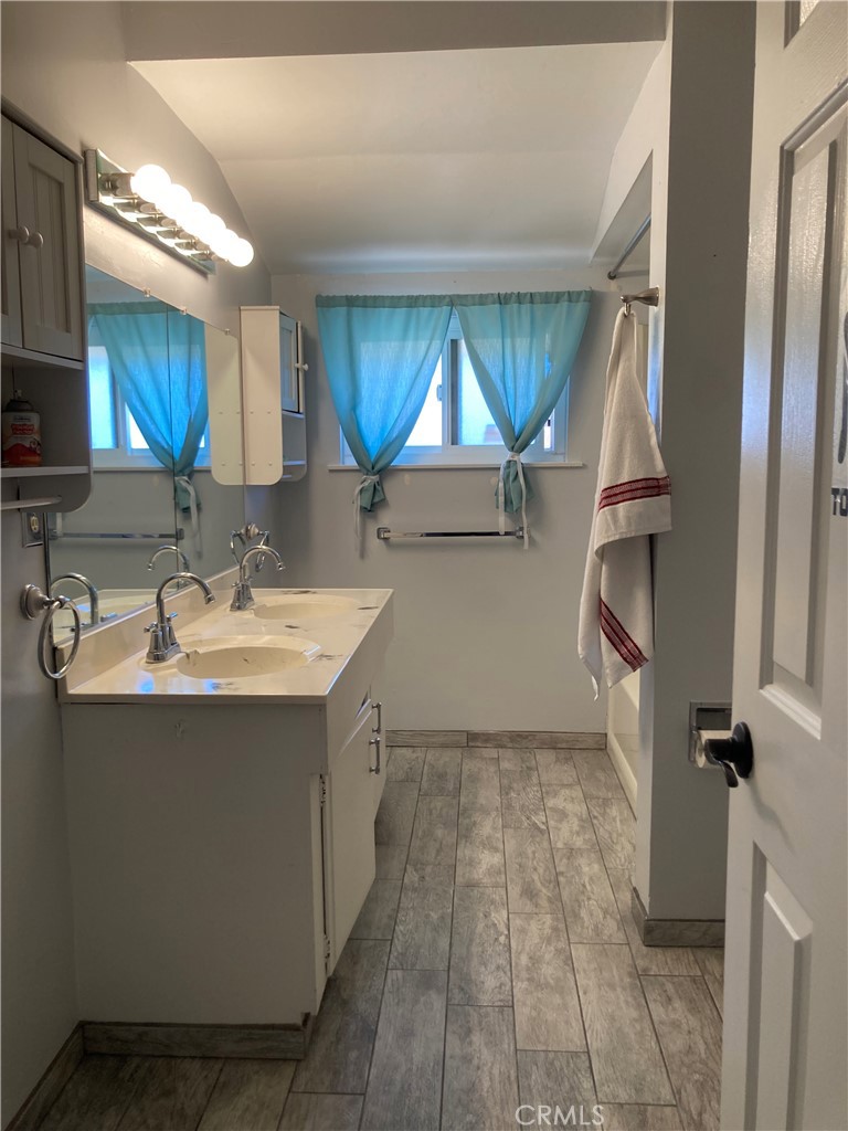 1201 Elizabeth Street Barstow, CA 92311 - Photo 18 of 19 a kitchen with a sink cabinets and appliances