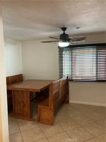 a kitchen with a stove a sink and a refrigerator