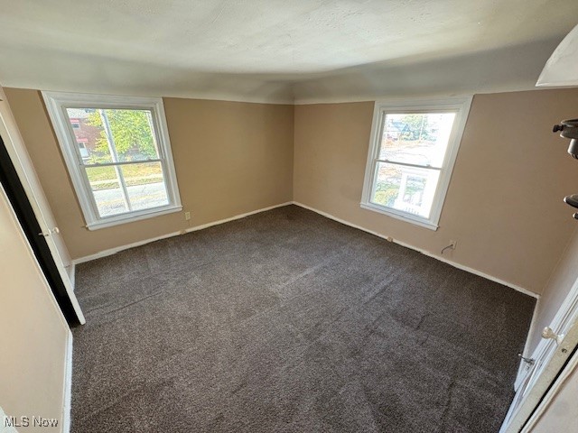 1507 Babbitt Road Euclid, OH 44132 - Photo 8 of 10 Unfurnished bedroom with carpet flooring and baseboards