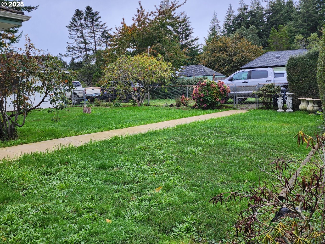 2605 Port Orford Loop Road Port Orford, OR 97465 - Photo 23 of 25 a front view of house with yard and green space