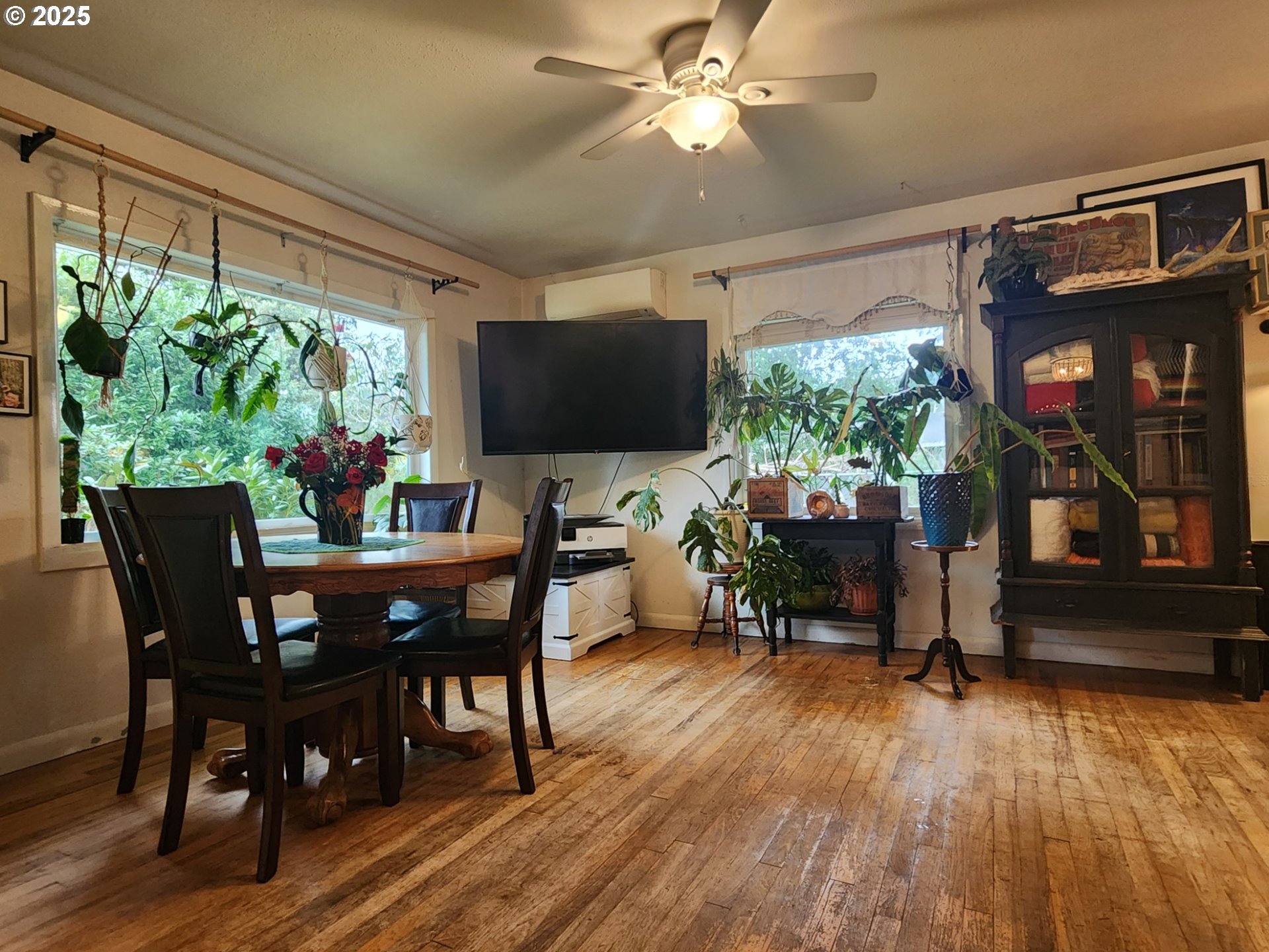 2605 Port Orford Loop Road Port Orford, OR 97465 - Photo 7 of 25 a view of a dining room with furniture window and wooden floor