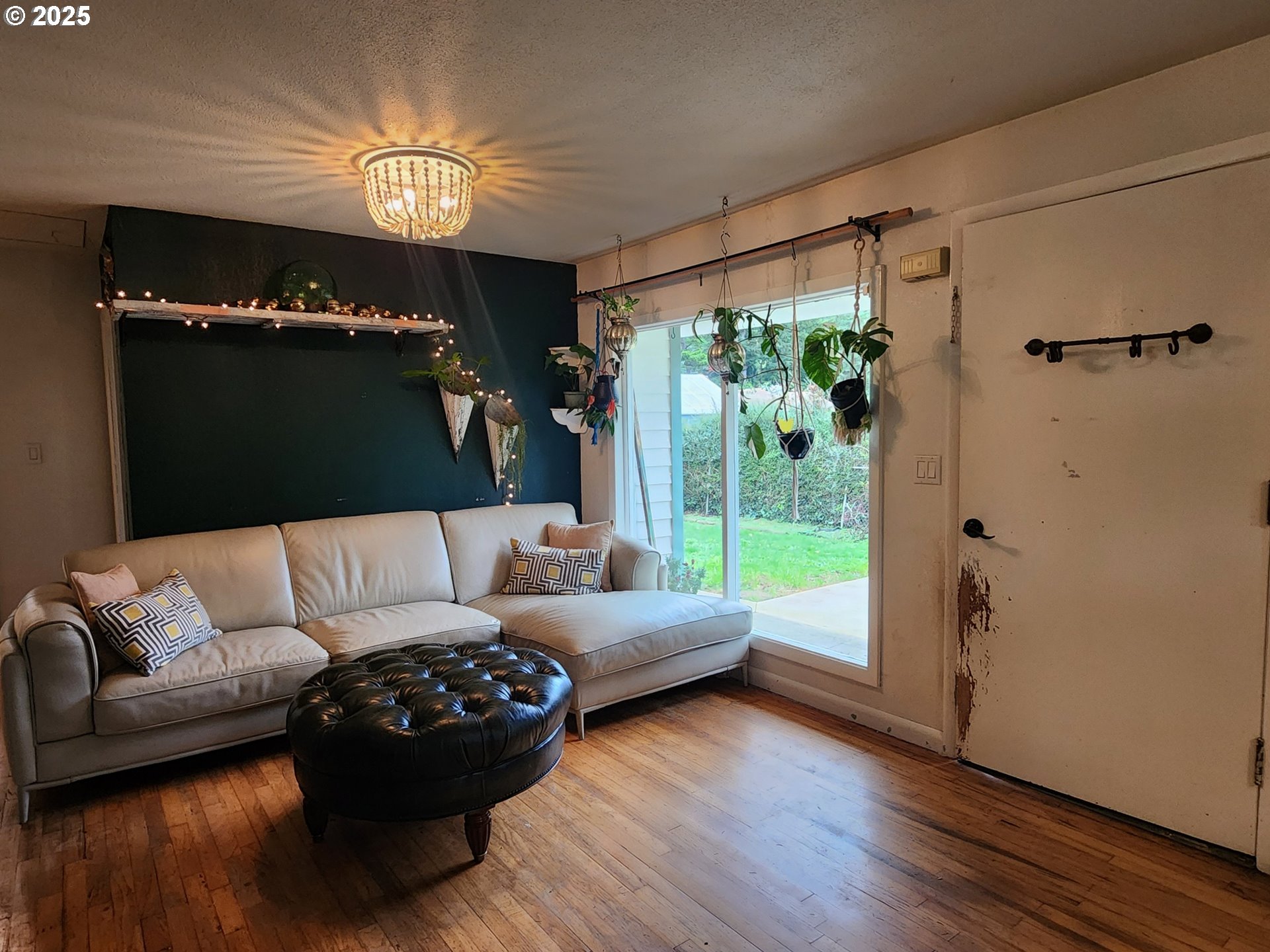 2605 Port Orford Loop Road Port Orford, OR 97465 - Photo 10 of 25 a living room with furniture and a large window