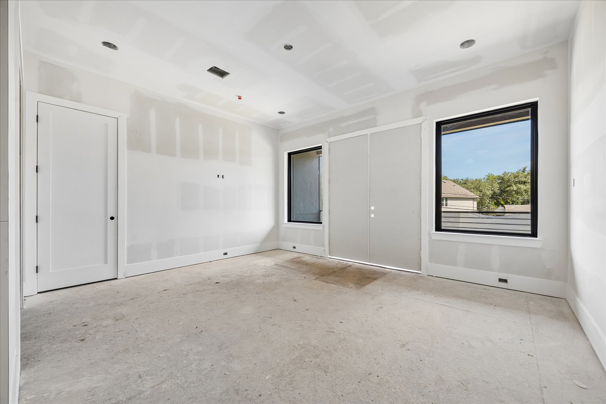 9050 Elizabeth Road Houston, TX 77055 - Photo 30 of 40 a view of an empty room with a window