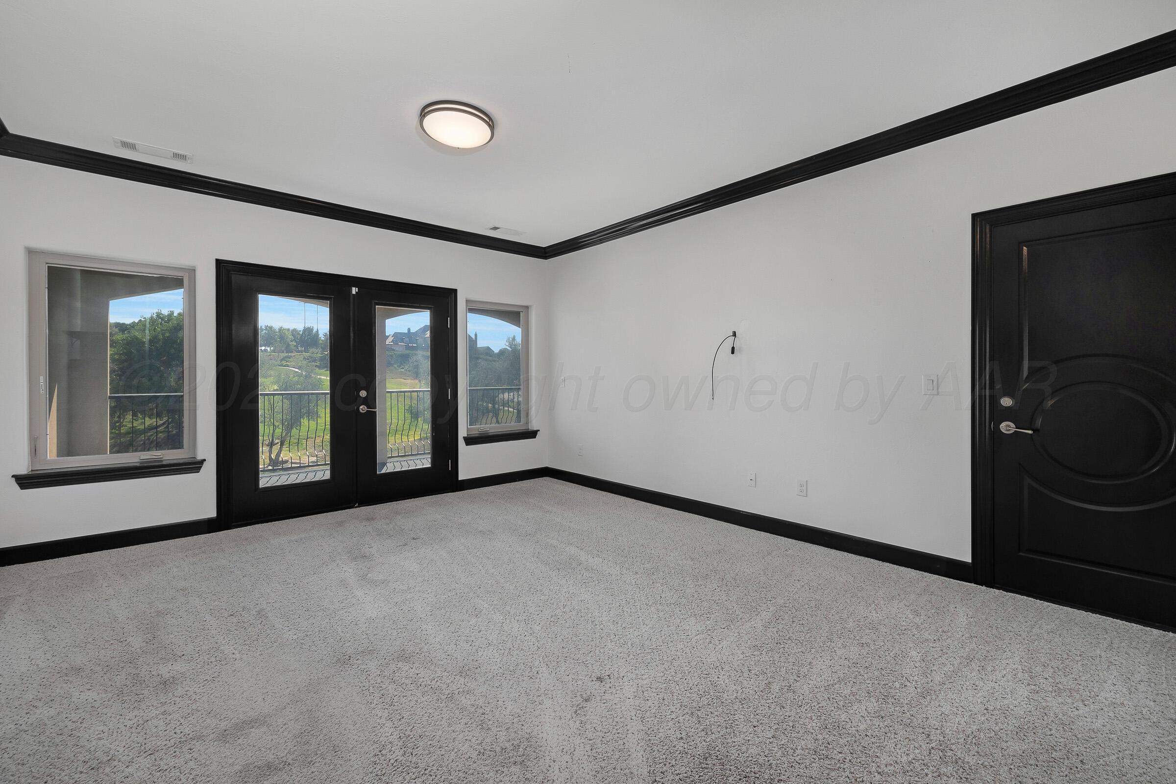 6 Merion Place Amarillo, TX 79124 - Photo 30 of 46 a view of an empty room with glass door and balcony