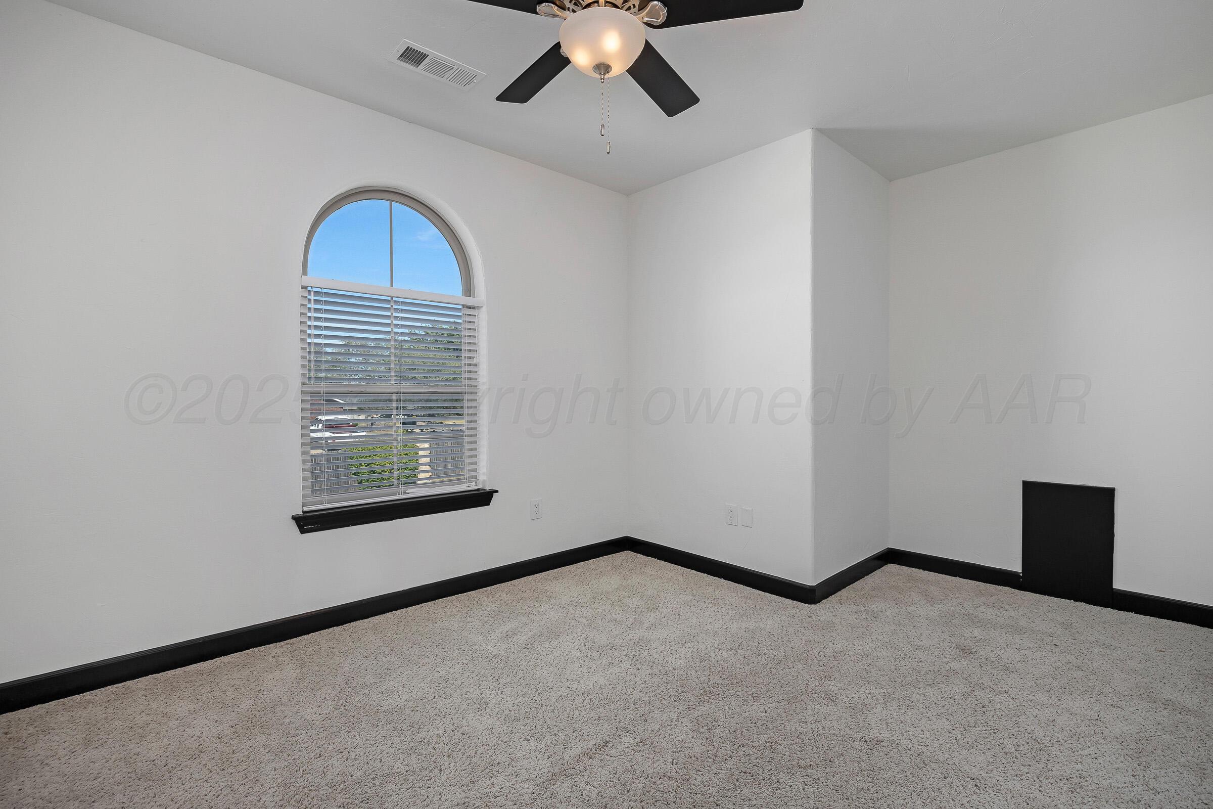 6 Merion Place Amarillo, TX 79124 - Photo 35 of 46 an empty room with windows