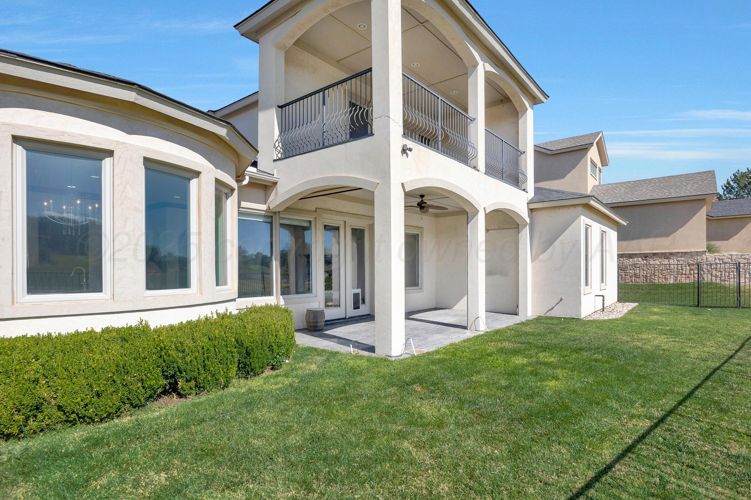 6 Merion Place Amarillo, TX 79124 - Photo 38 of 46 a view of a white house next to a yard
