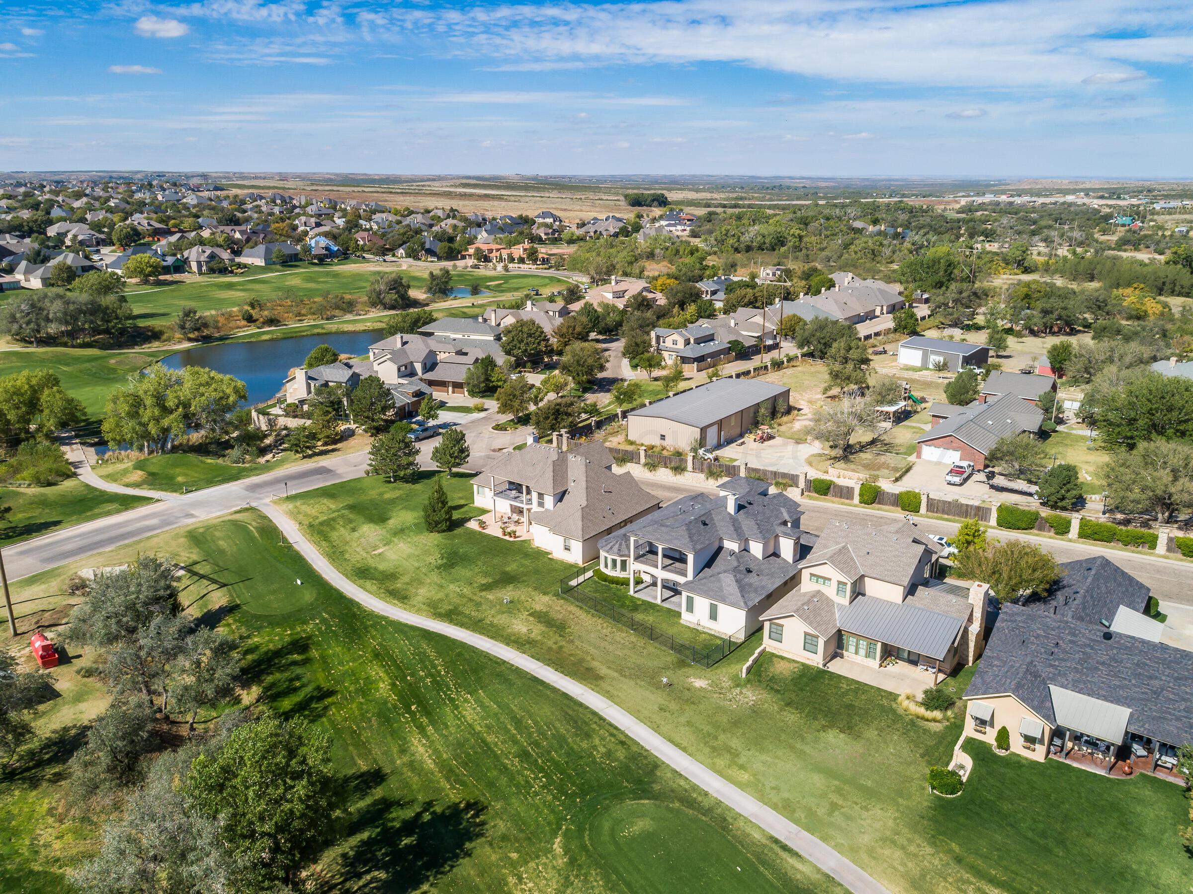 6 Merion Place Amarillo, TX 79124 - Photo 44 of 46 an aerial view of residential houses with outdoor space and river