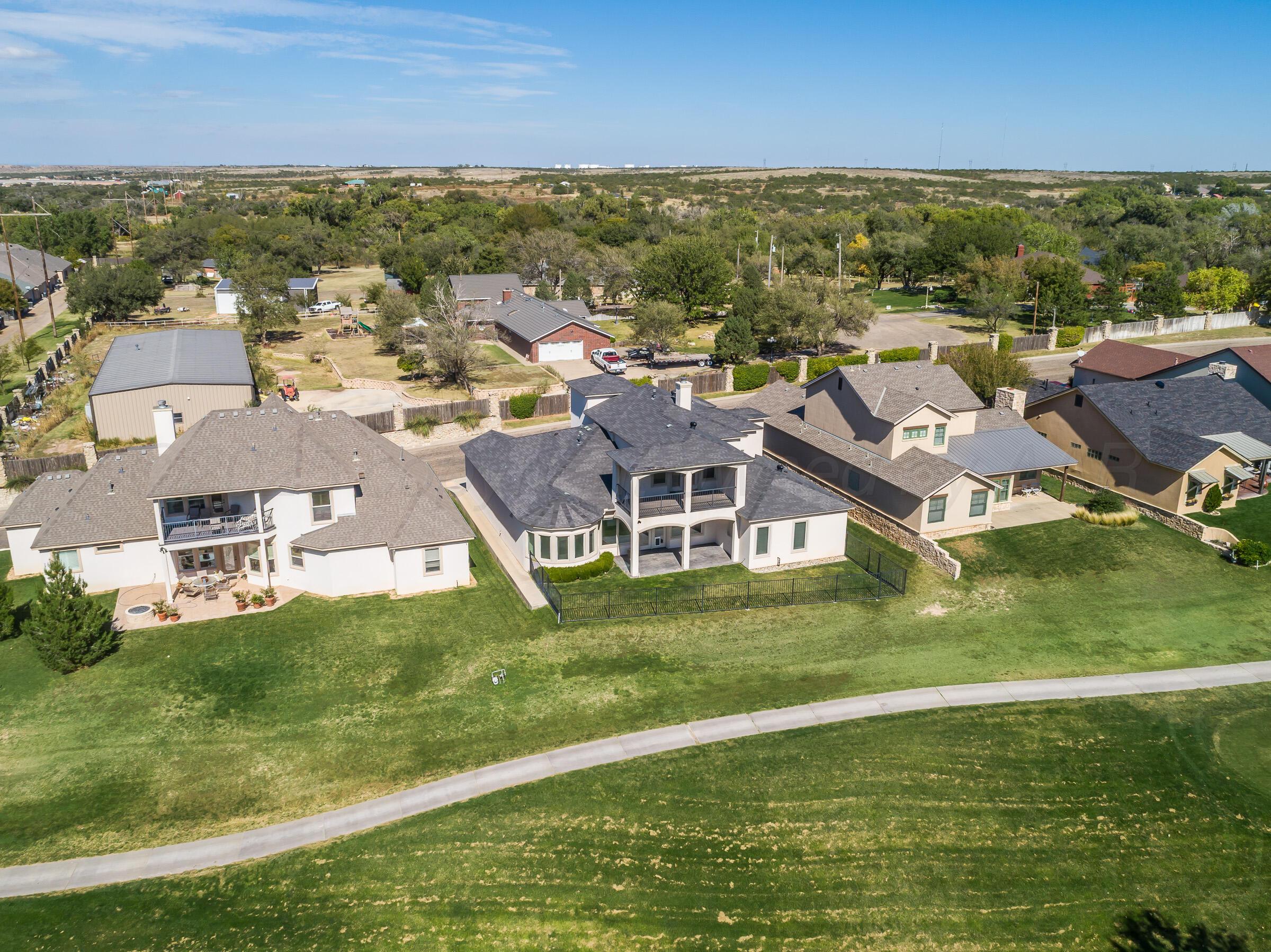 6 Merion Place Amarillo, TX 79124 - Photo 45 of 46 an aerial view of residential houses with outdoor space and ocean view