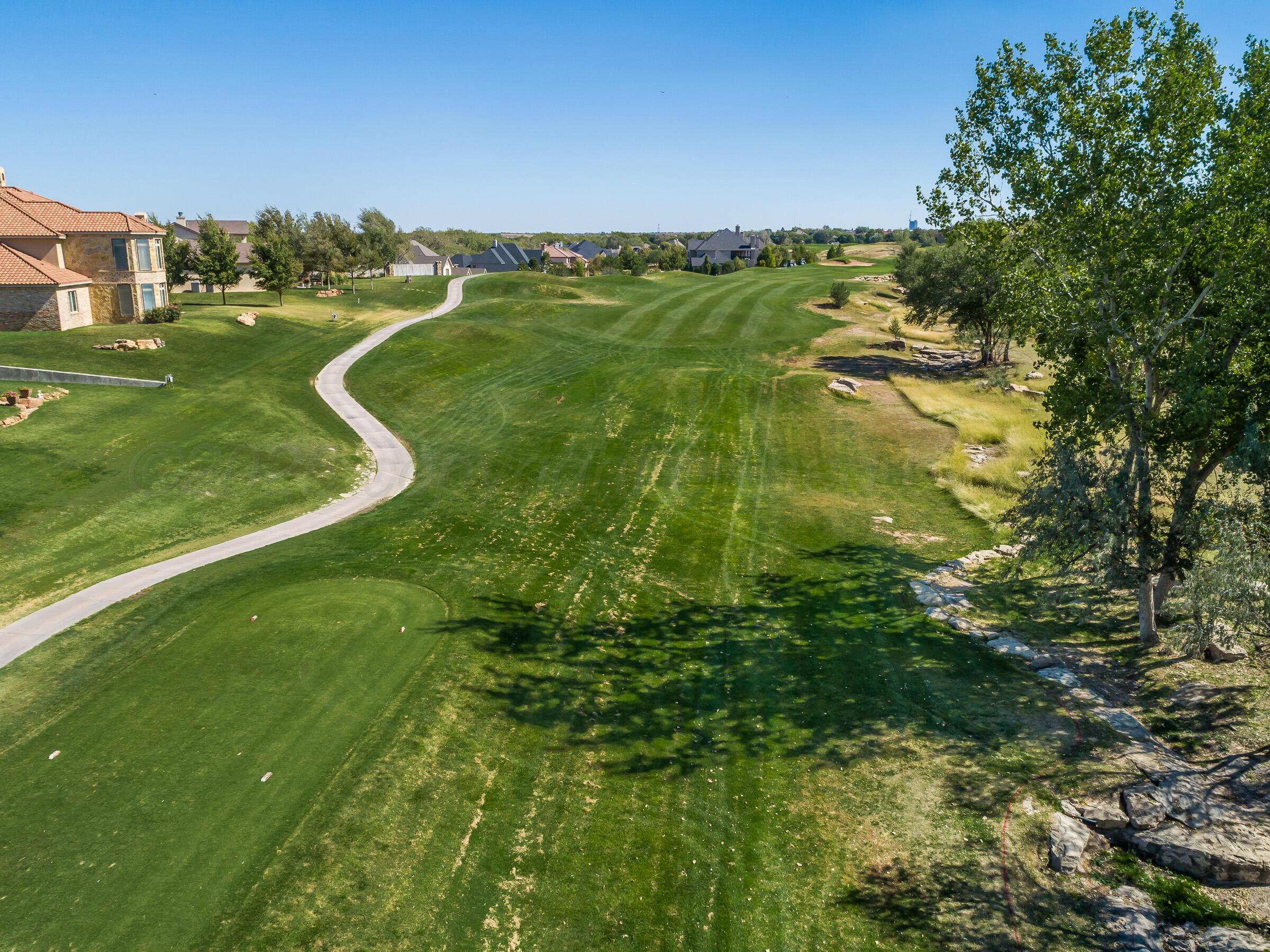 6 Merion Place Amarillo, TX 79124 - Photo 46 of 46 a view of a lake from a yard
