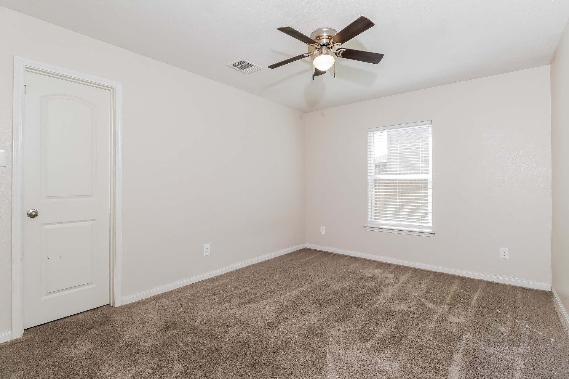 20017 Hubert R Humphrey Road Manor, TX 78653 - Photo 13 of 27 Well-lit interior space provides a versatile canvas for personalized decor and furnishings.