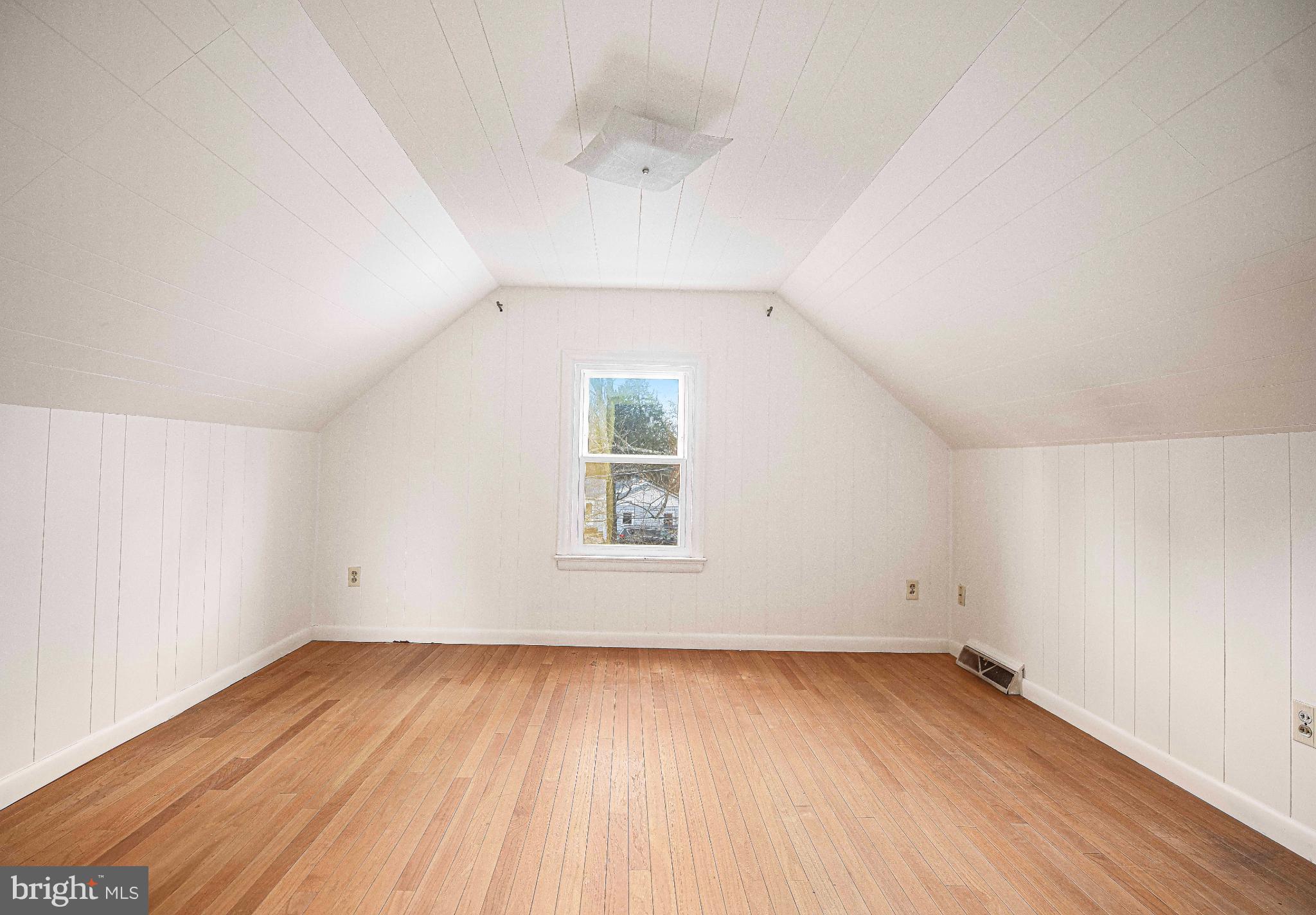 518 Paradise Road Aberdeen, MD 21001 - Photo 20 of 37 Bright, airy attic space with wooden floors.
