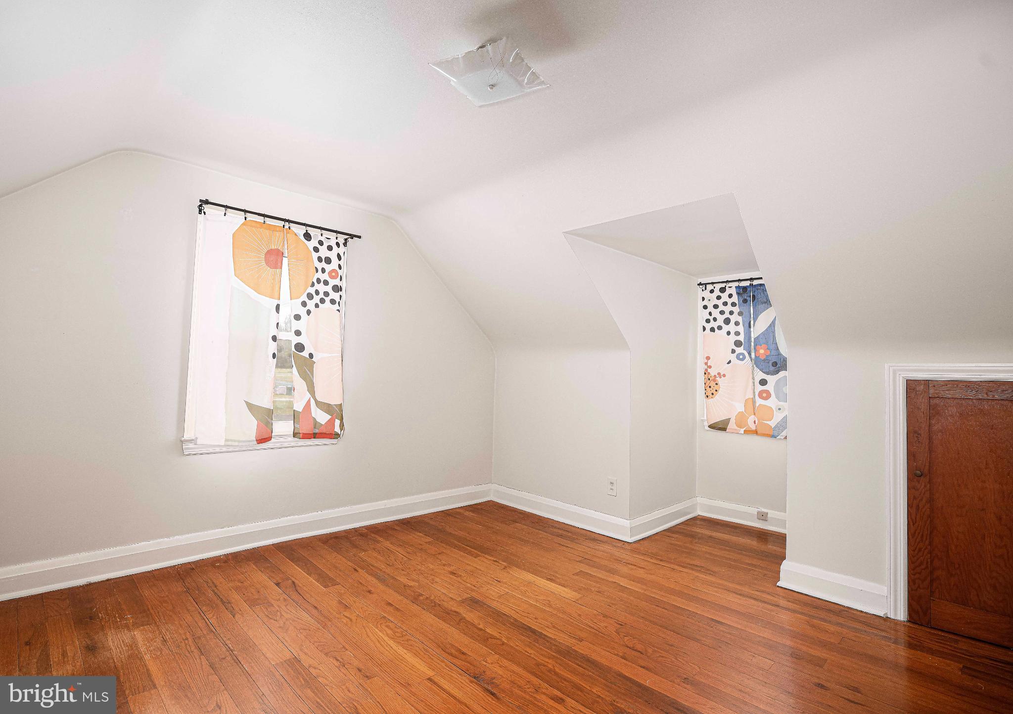 518 Paradise Road Aberdeen, MD 21001 - Photo 22 of 37 Bright, airy attic space with playful curtains.