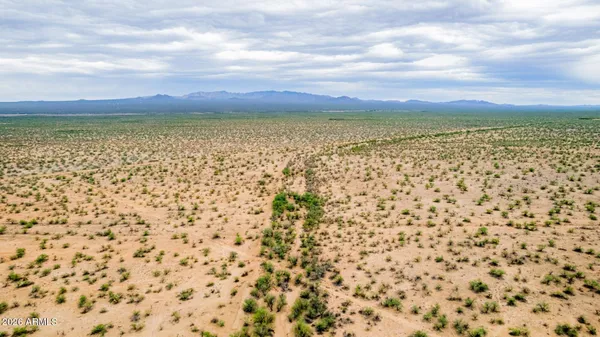 a view of lake and mountain