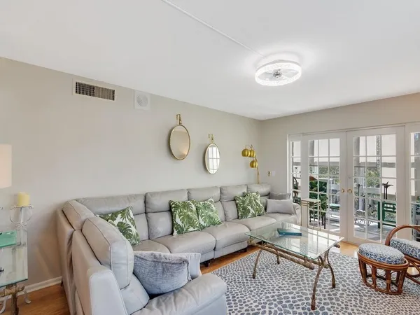 a bedroom with a bed and a table