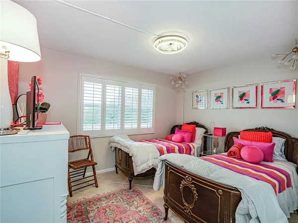 an aerial view of a house with a lake view