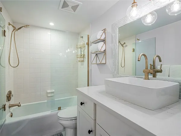 an aerial view of a house with a ocean view