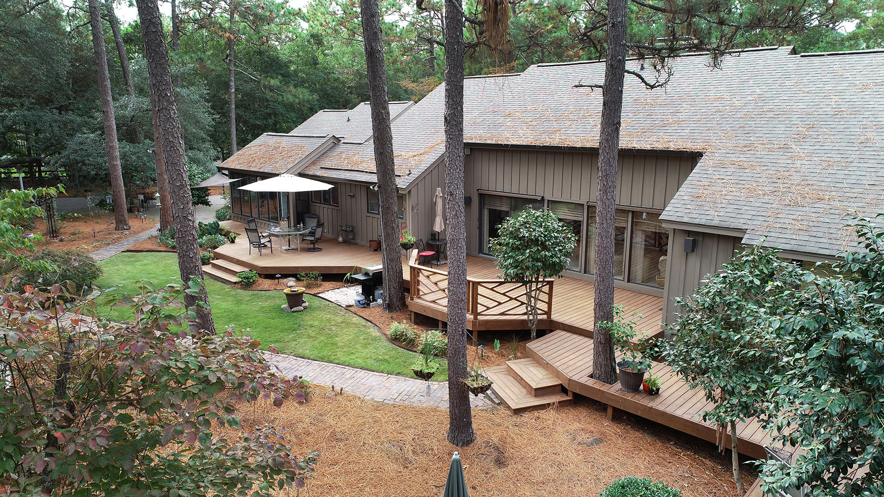 40 Campbell Road Pinehurst, NC 28374 - Photo 3 of 39 Back Exterior with expansive Deck