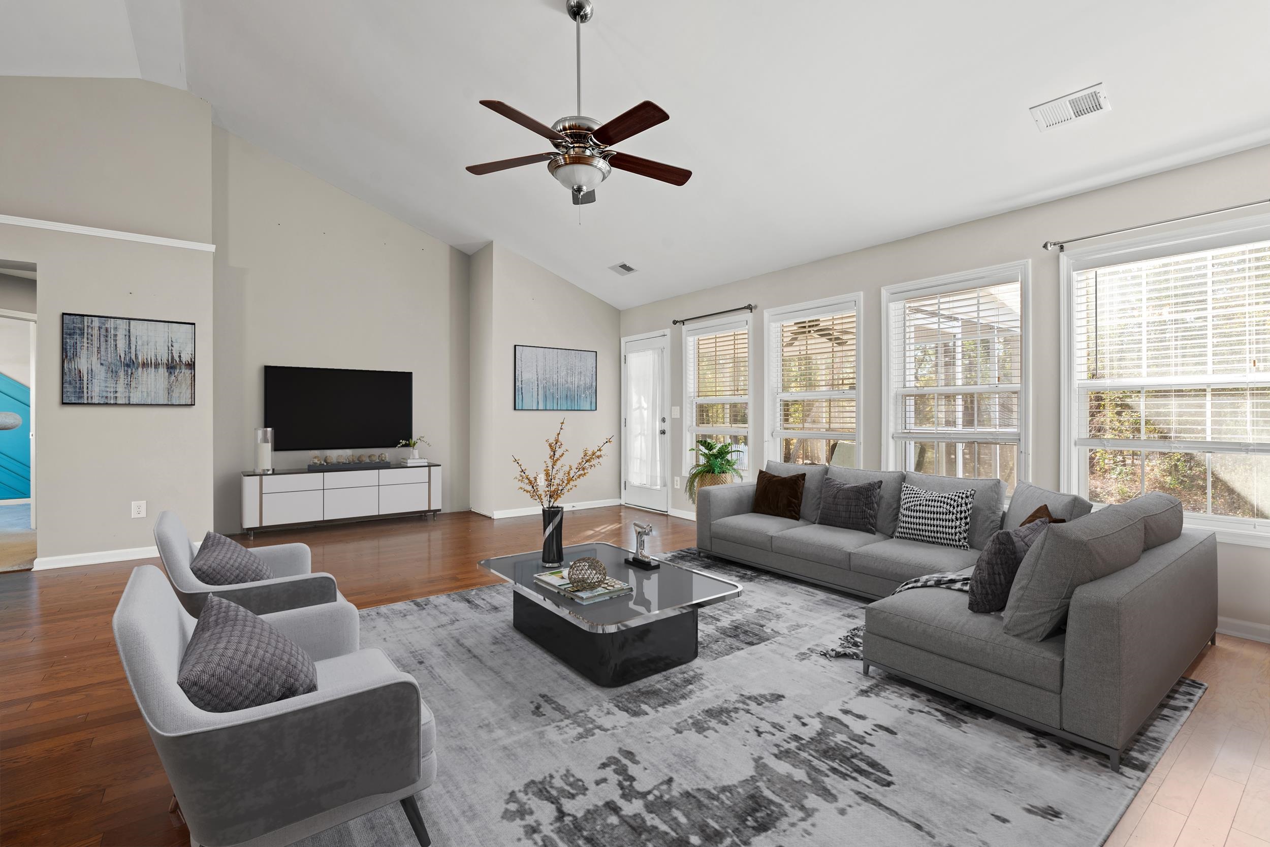 2487 Windmill Way Myrtle Beach, SC 29579 - Photo 12 of 40 Living area with hardwood / wood-style flooring, a ceiling fan, and high vaulted ceiling