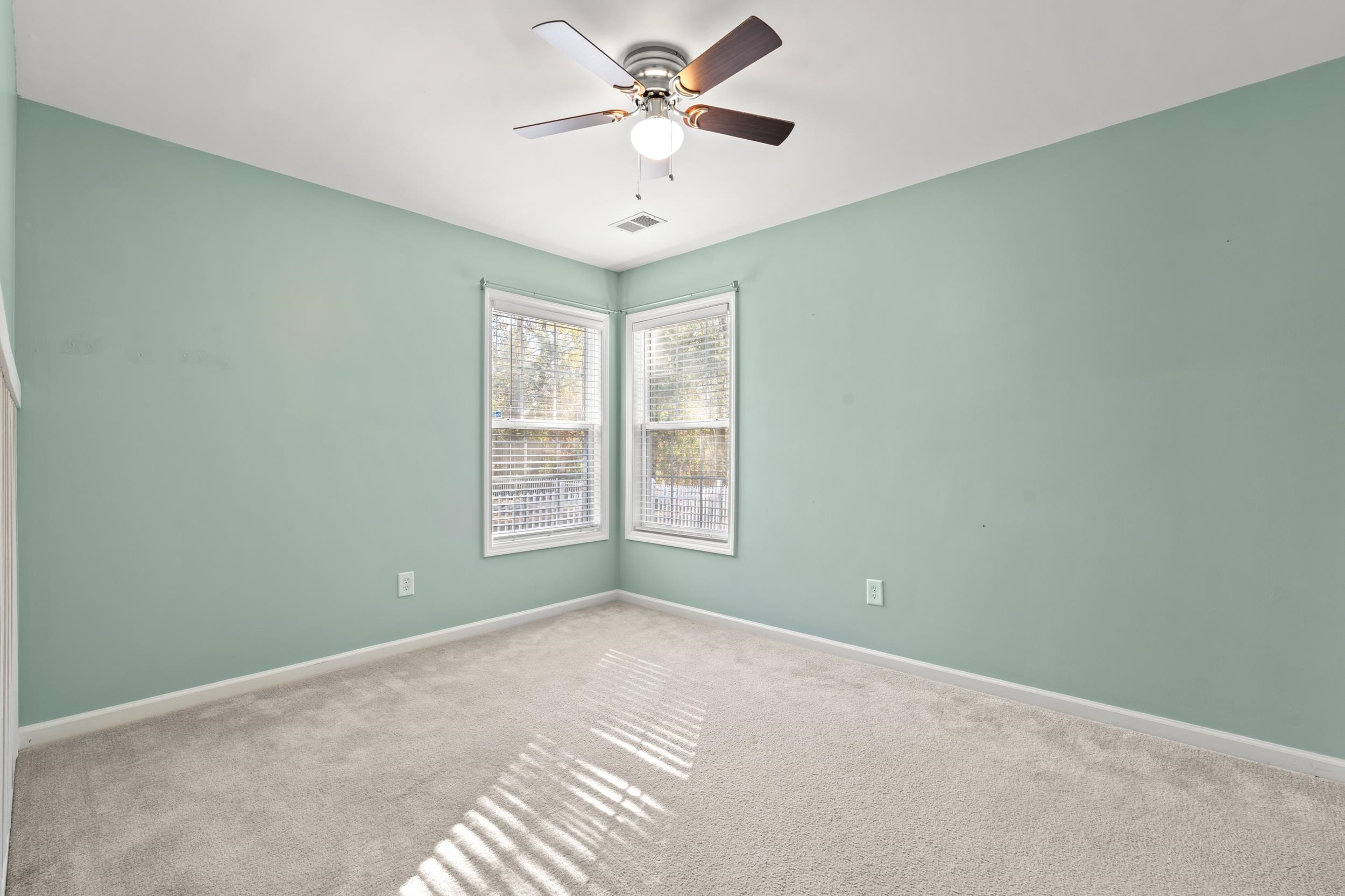 2487 Windmill Way Myrtle Beach, SC 29579 - Photo 26 of 40 Carpeted spare room with baseboards and ceiling fan