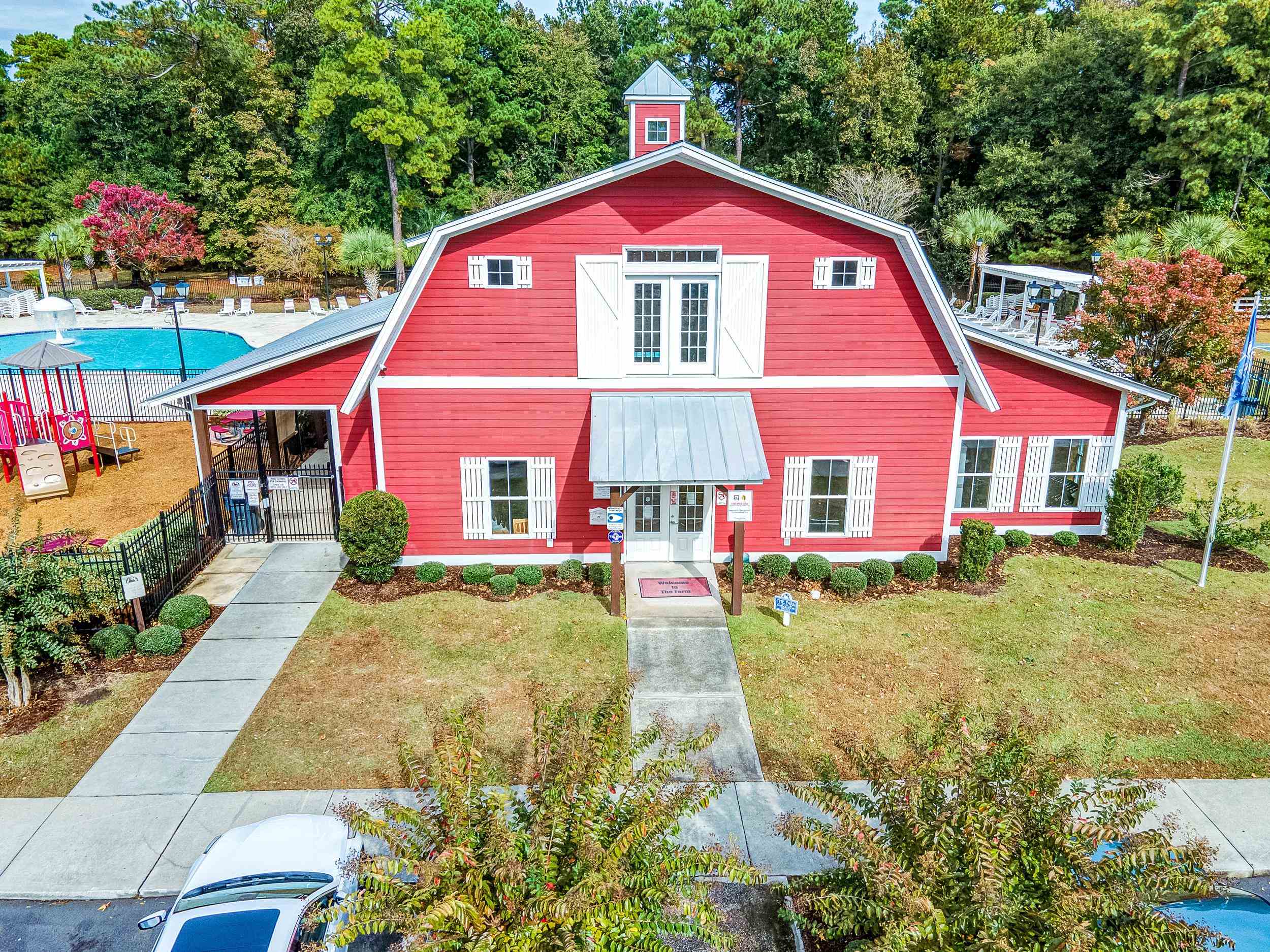 2487 Windmill Way Myrtle Beach, SC 29579 - Photo 36 of 40 View of front of house featuring a gambrel roof and a community pool