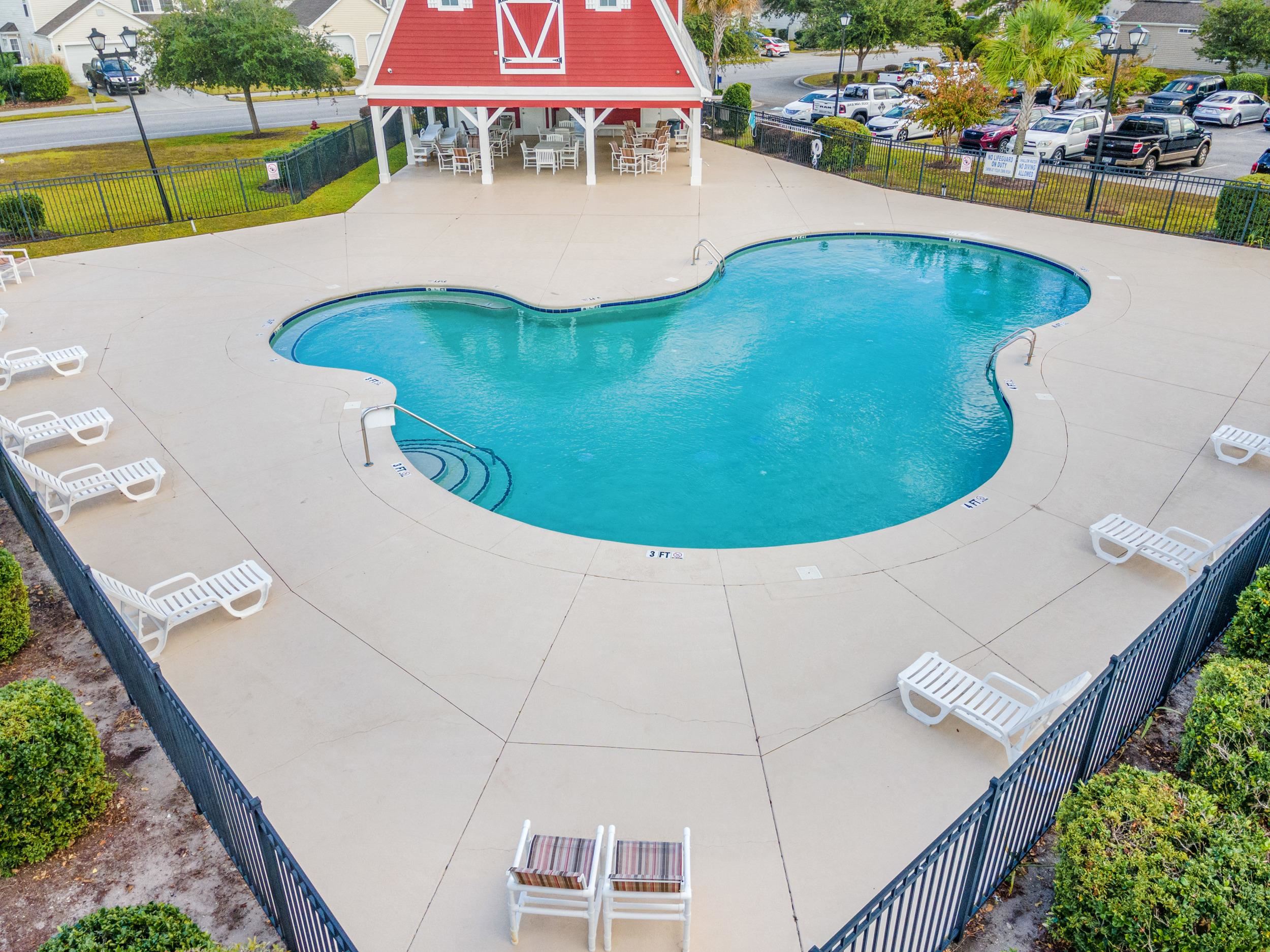 2487 Windmill Way Myrtle Beach, SC 29579 - Photo 40 of 40 Community pool with a patio