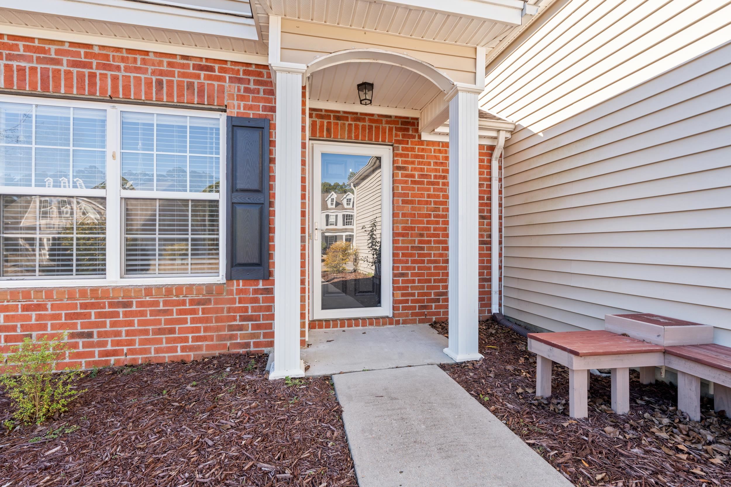 2487 Windmill Way Myrtle Beach, SC 29579 - Photo 5 of 40 View of exterior entry featuring brick siding