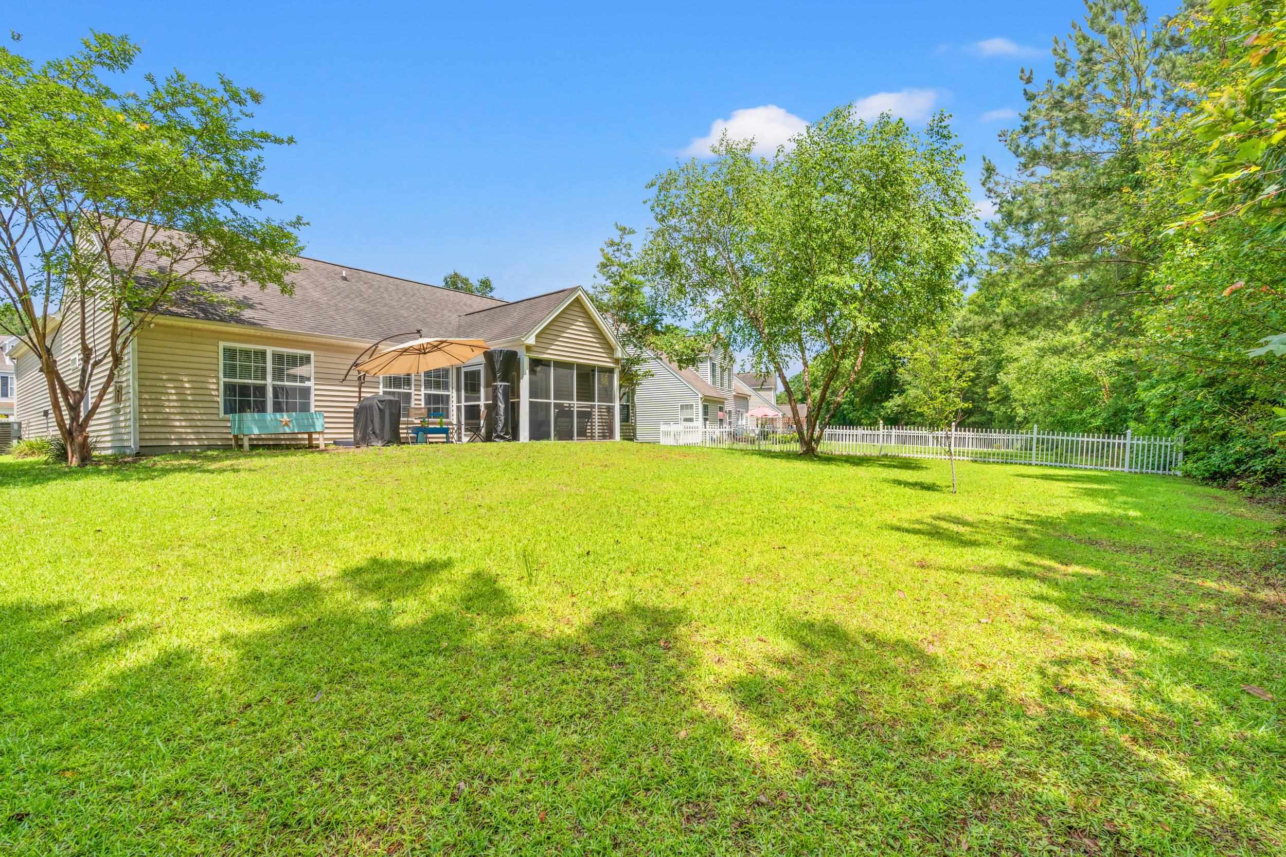 2487 Windmill Way Myrtle Beach, SC 29579 - Photo 8 of 40 Rear view of property with a sunroom