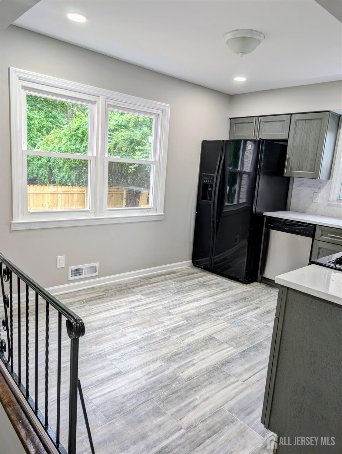 76 Glenville Road, Unit 76 Edison, NJ 08817 - Photo 5 of 13 a bedroom with a bed and wooden floor