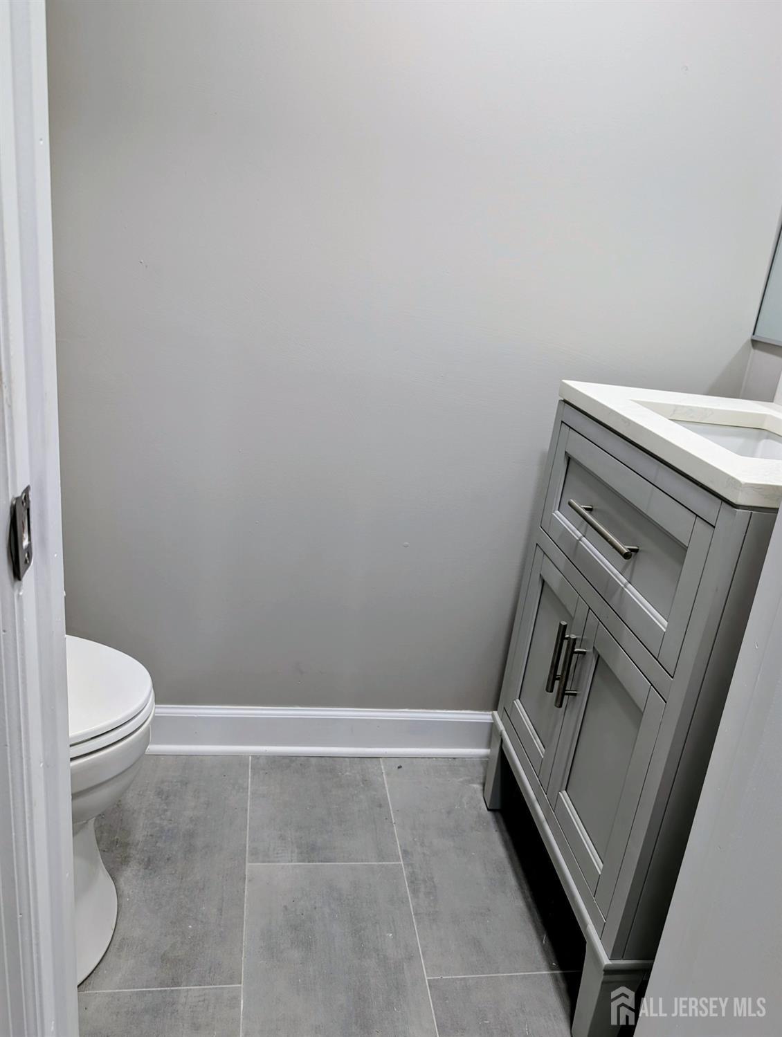 76 Glenville Road, Unit 76 Edison, NJ 08817 - Photo 7 of 13 a bathroom with a sink toilet and tub