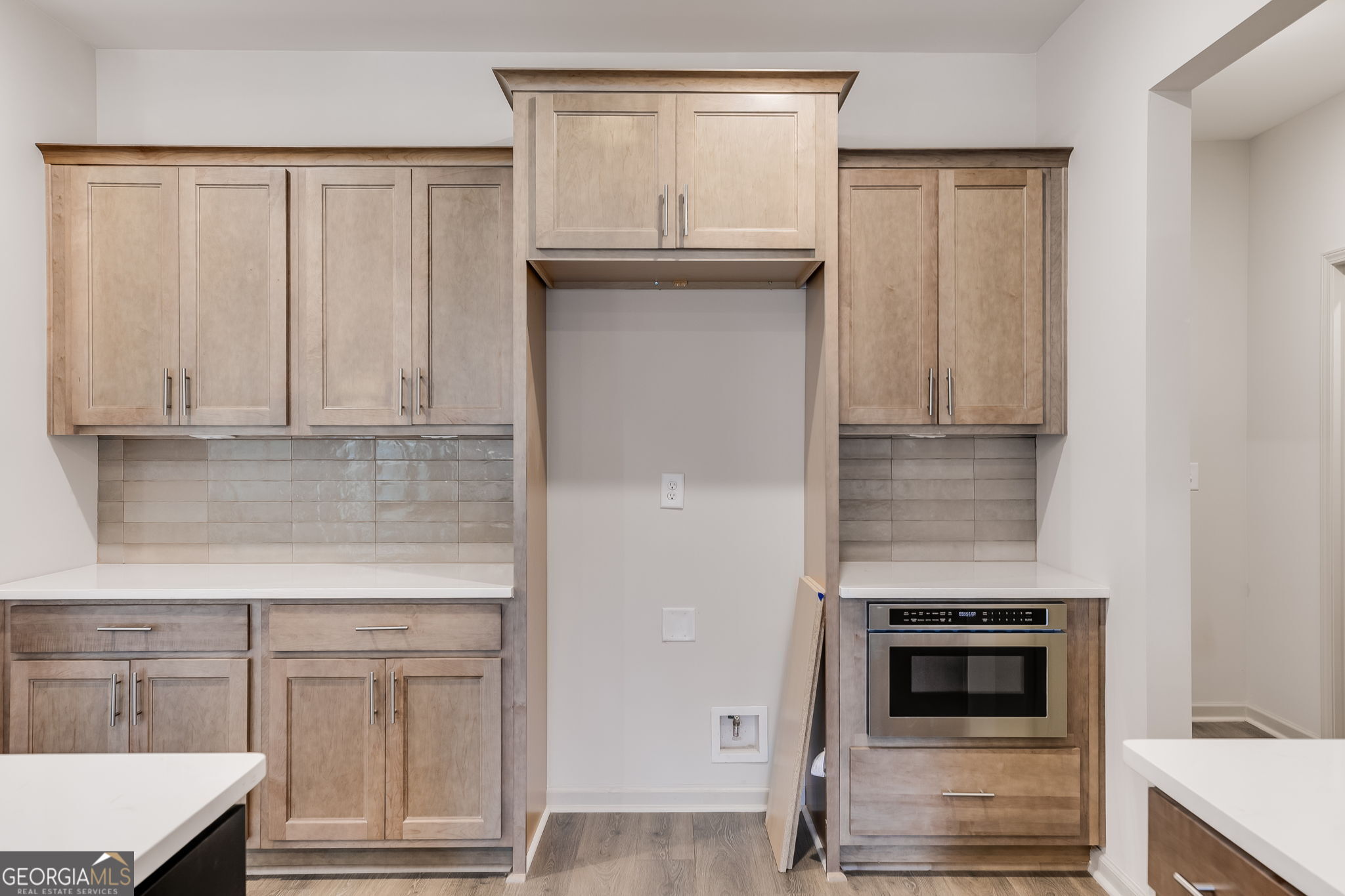 3262 Veal Road Roopville, GA 30170 - Photo 19 of 46 a kitchen with granite countertop white cabinets and stainless steel appliances