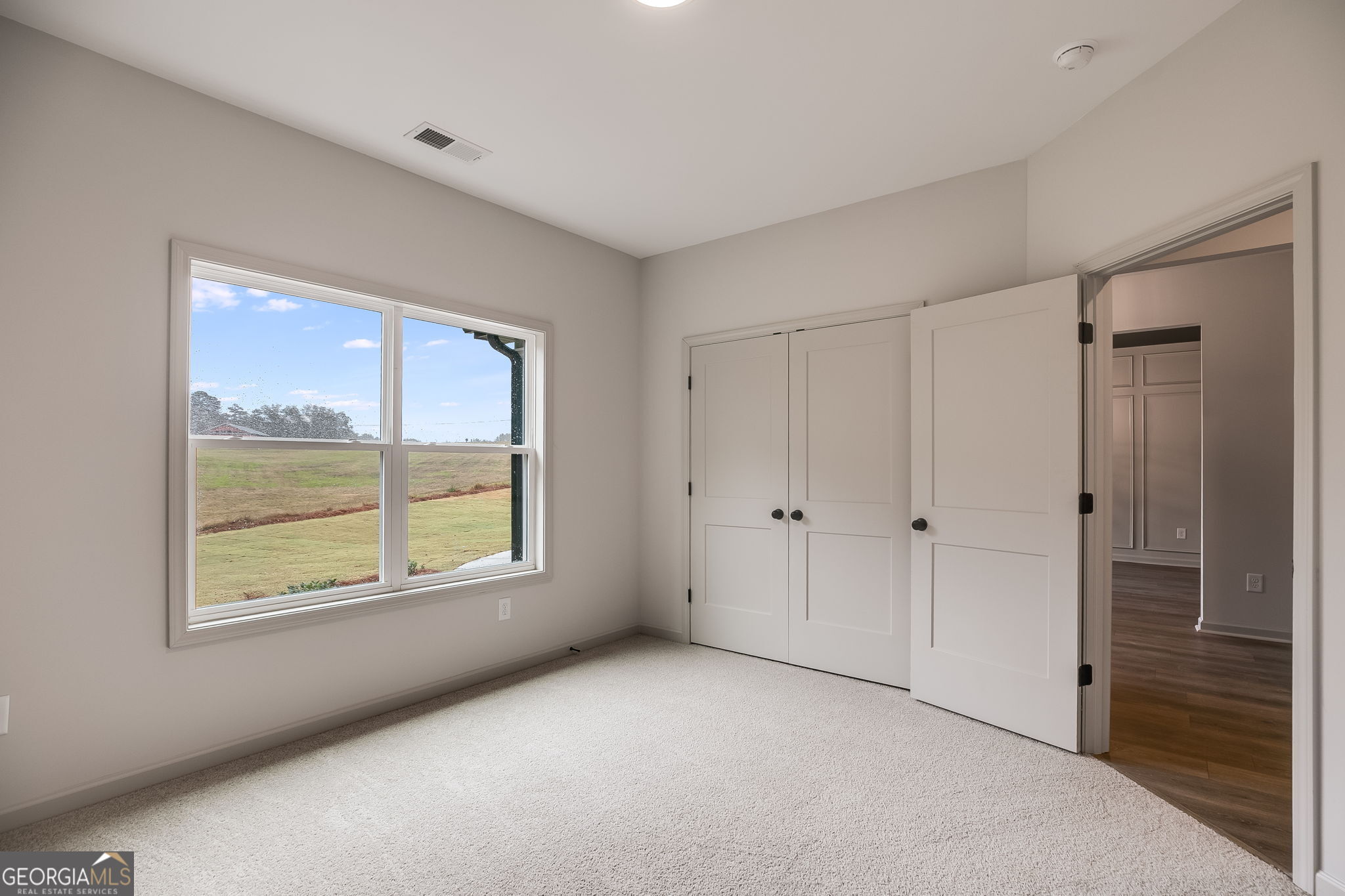 3262 Veal Road Roopville, GA 30170 - Photo 32 of 46 a view of an empty room with a window