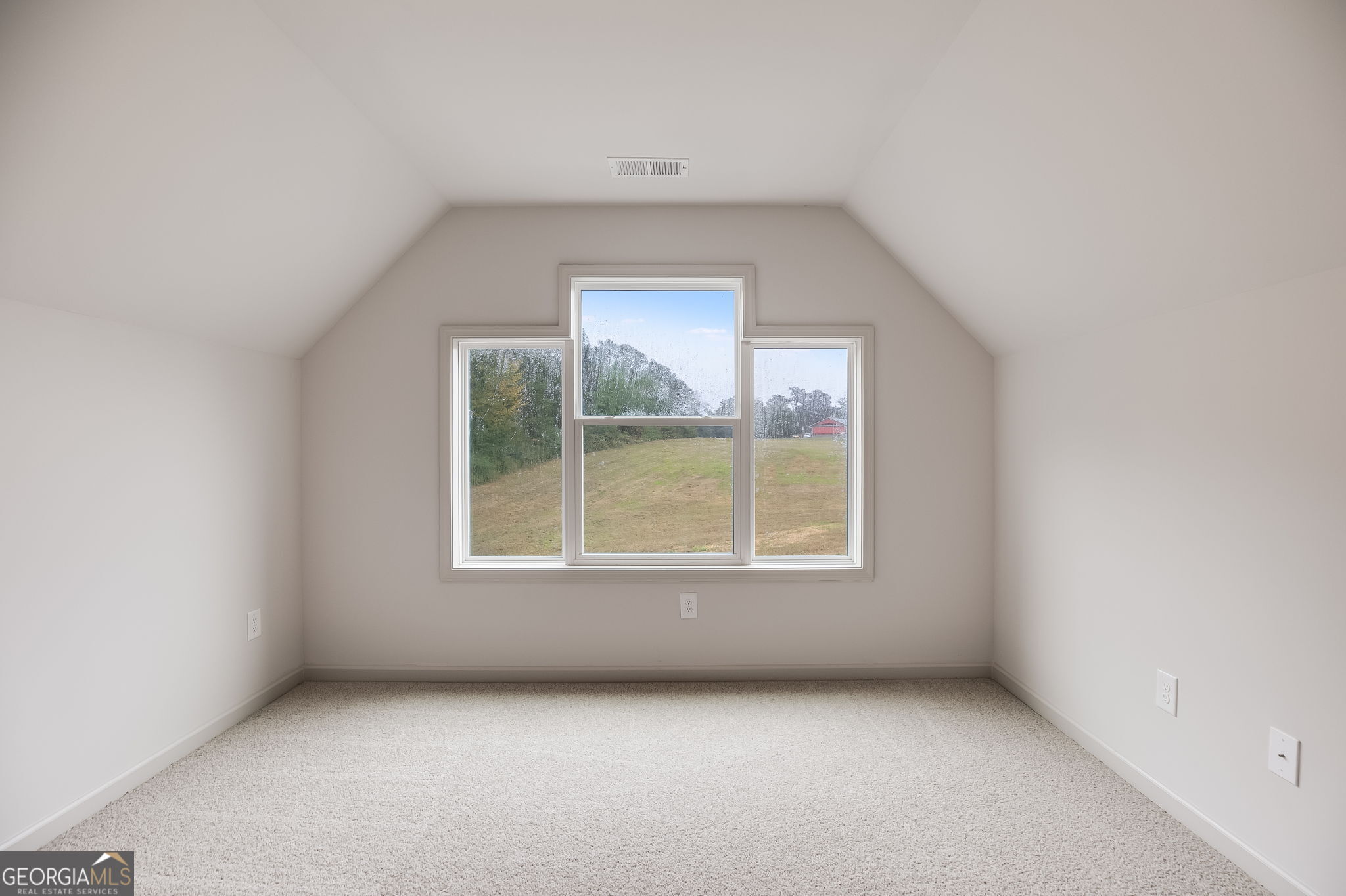 3262 Veal Road Roopville, GA 30170 - Photo 39 of 46 an empty room with a window