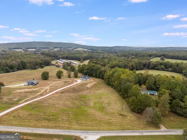 a house that has a large window in front of it