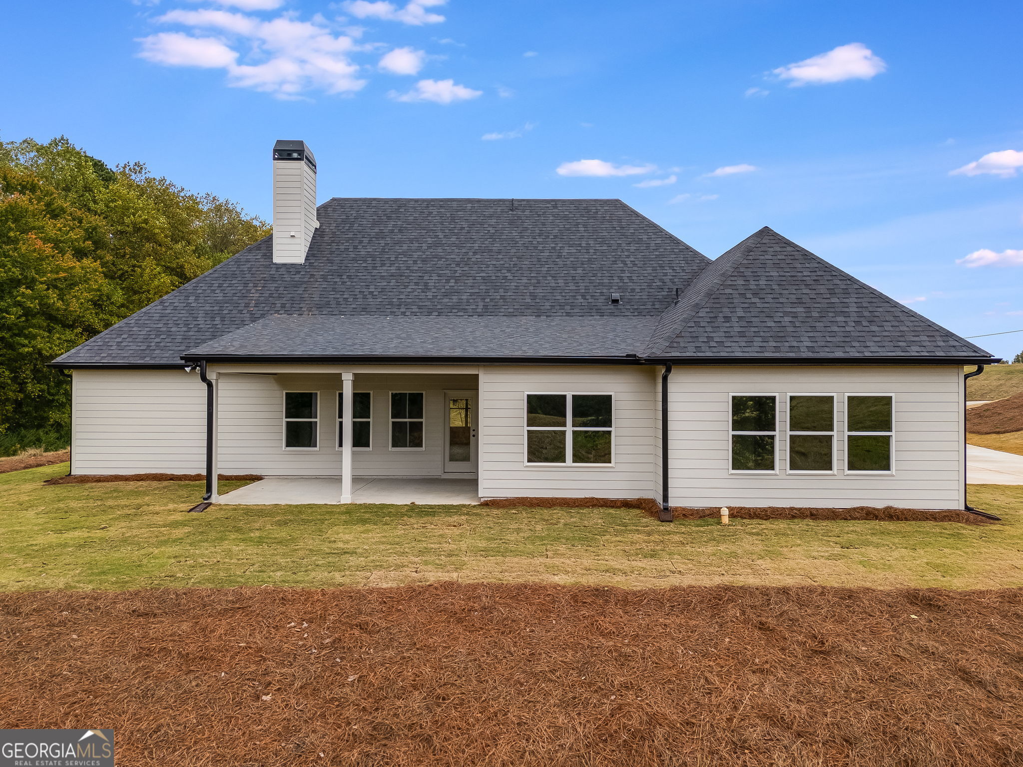 3262 Veal Road Roopville, GA 30170 - Photo 44 of 46 a house that has a large window in front of it